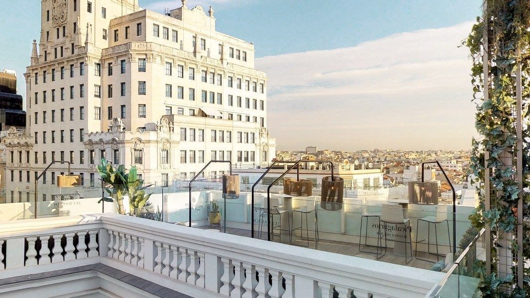 The terrace at Picalagartos Sky Bar in Madrid, with the Telefonica building alongside and the city beyond